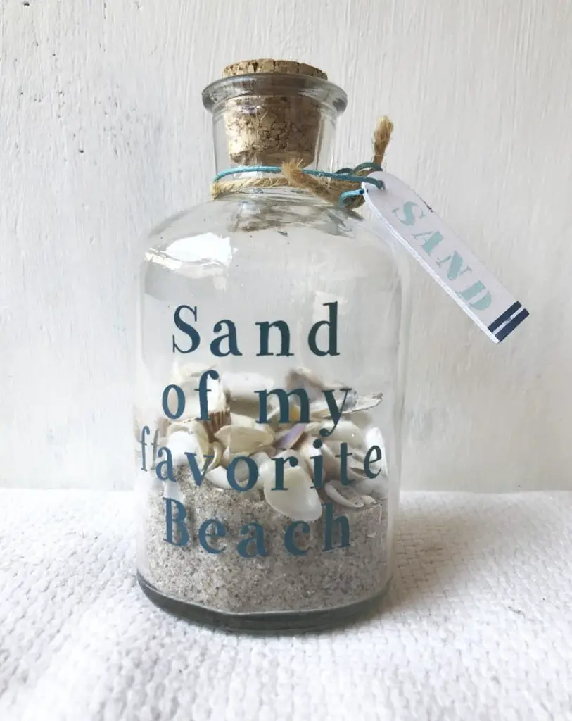 arena de playa en una botella decoracion